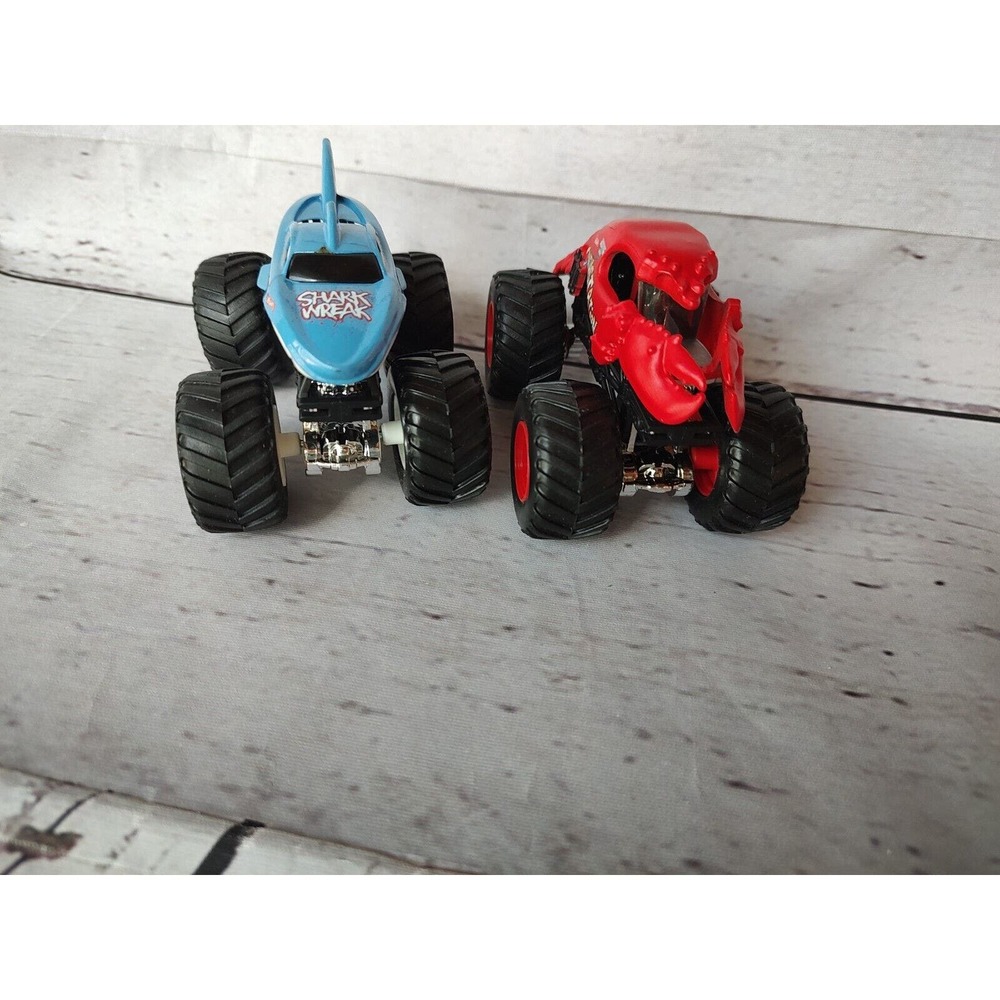 Hot Wheels Monster Jam Monster Trucks Crushstation and Shark Wreak Toys